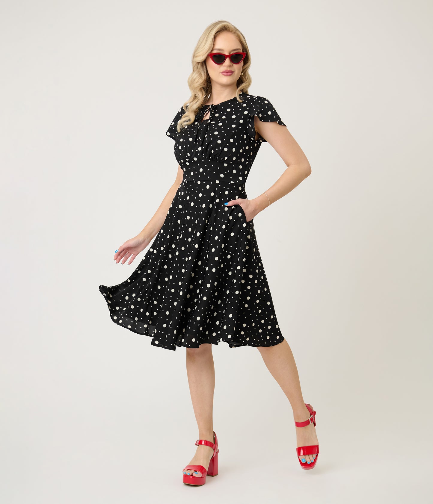 Voodoo Vixen Black & White Polka Dot Flutter Sleeve Fit & Flare Dress