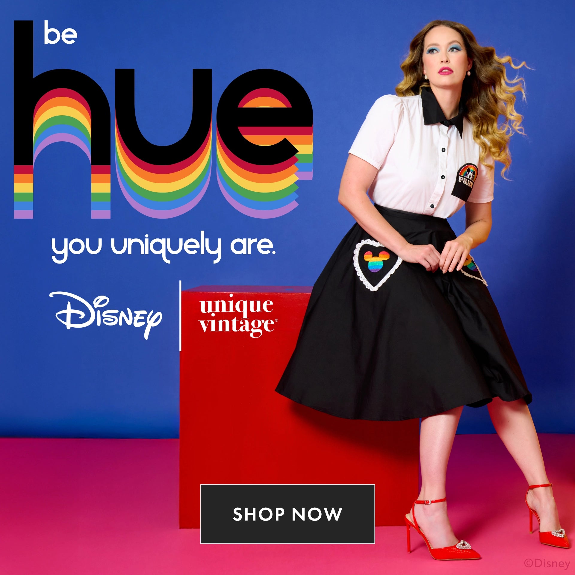 Disney Price Collection by Unique Vintage. Promotional image for 'be hue' with a model wearing a vintage outfit against a colorful background.