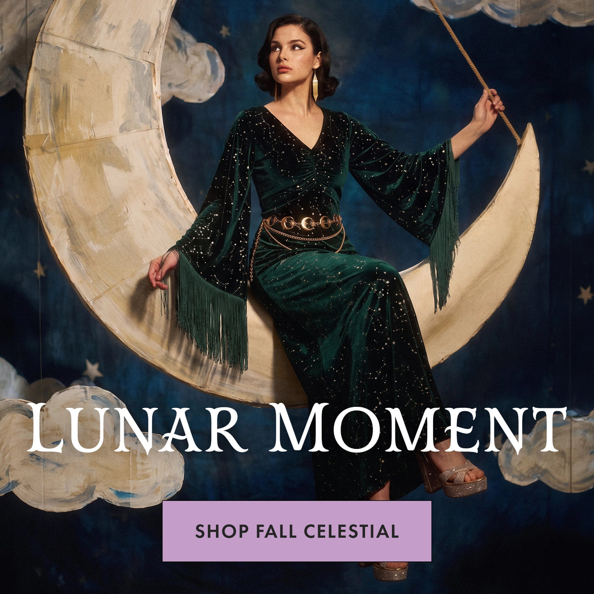 A woman wearing a dark green velvet fringe gown with sequined details sits on a large crescent moon prop against a dark blue starry background. Large text reads 'LUNAR MOMENT' with a purple banner below saying 'SHOP FALL CELESTIAL'.