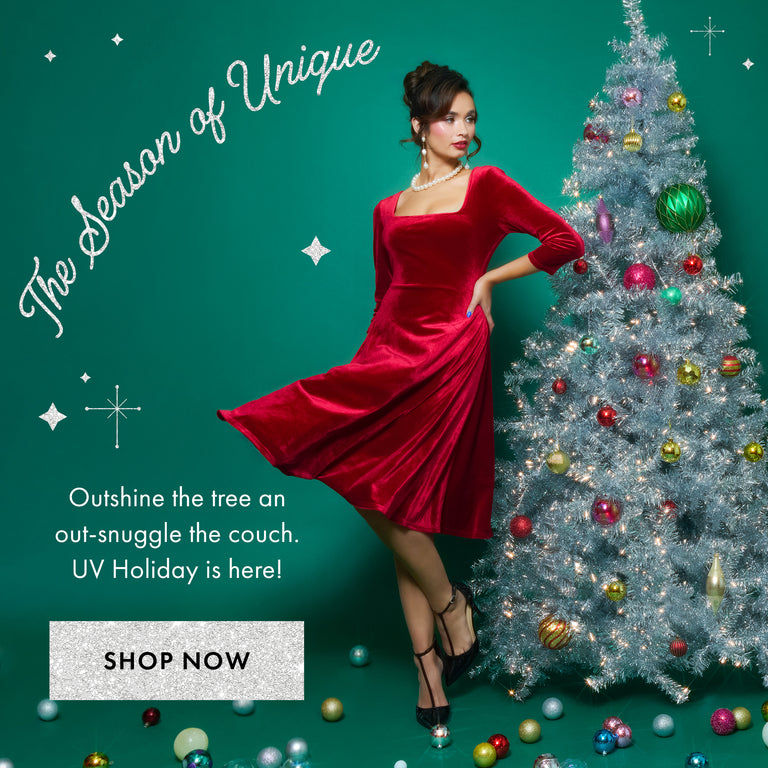 Woman in a red dress standing next to a decorated Christmas tree with promotional text on a teal background.