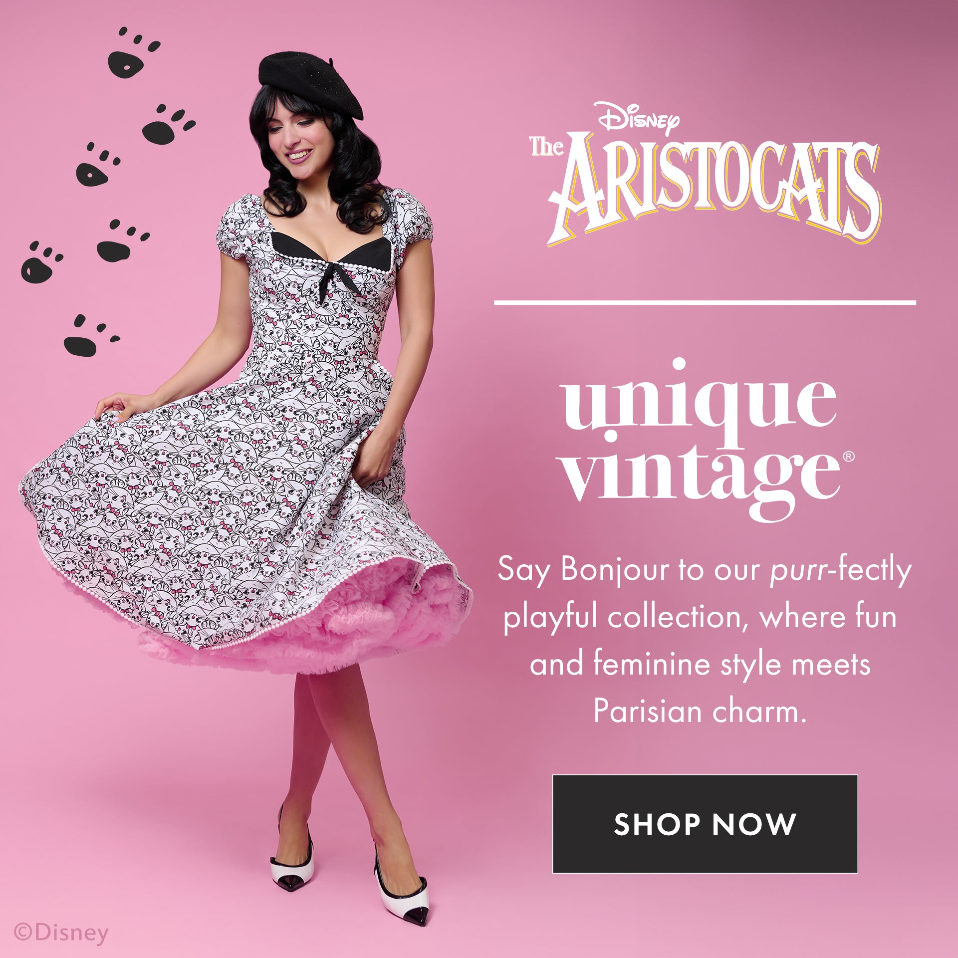 Woman in vintage-style dress with 'The Aristocats' branding on a pink background