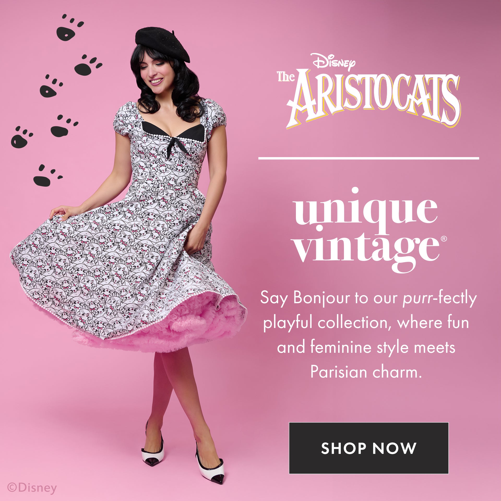 Woman in vintage-style dress with 'The Aristocats' branding on a pink background
