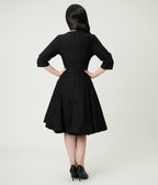 Black Surplice Neck Swing Dress