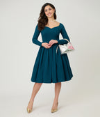 Unique Vintage 1950s Teal Sweetheart Swing Dress