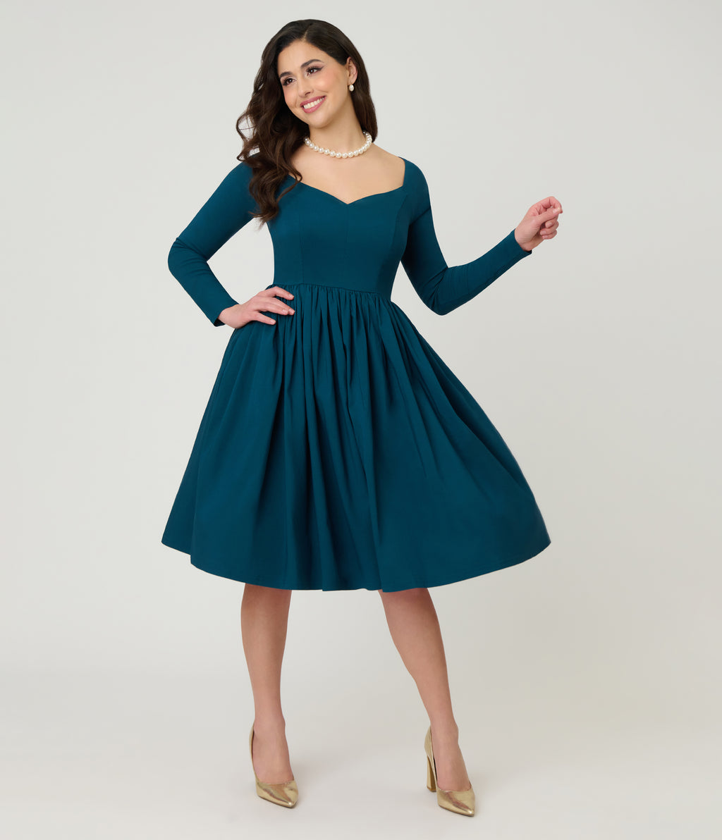 Unique Vintage 1950s Teal Sweetheart Swing Dress