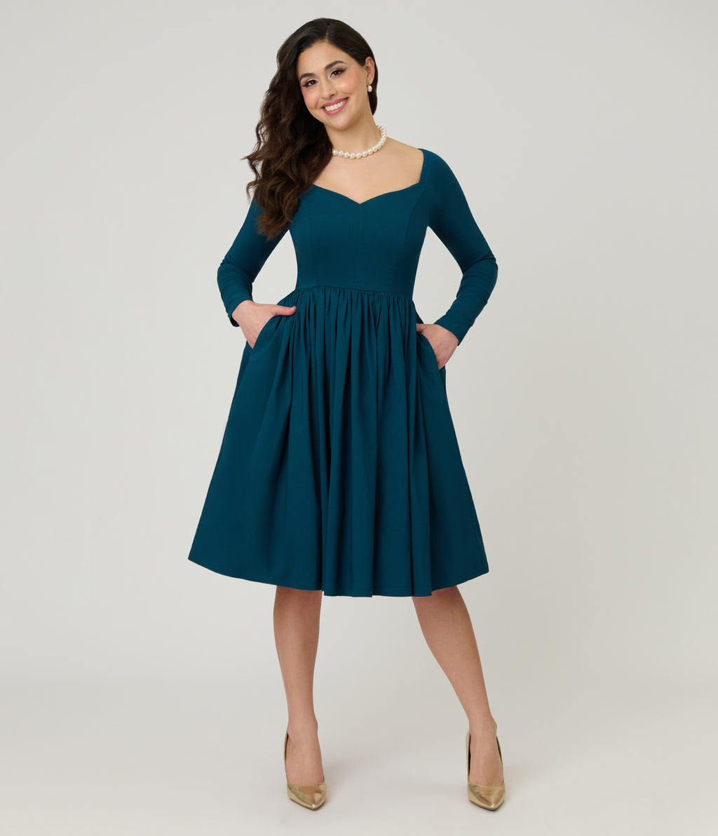 Unique Vintage 1950s Teal Sweetheart Swing Dress