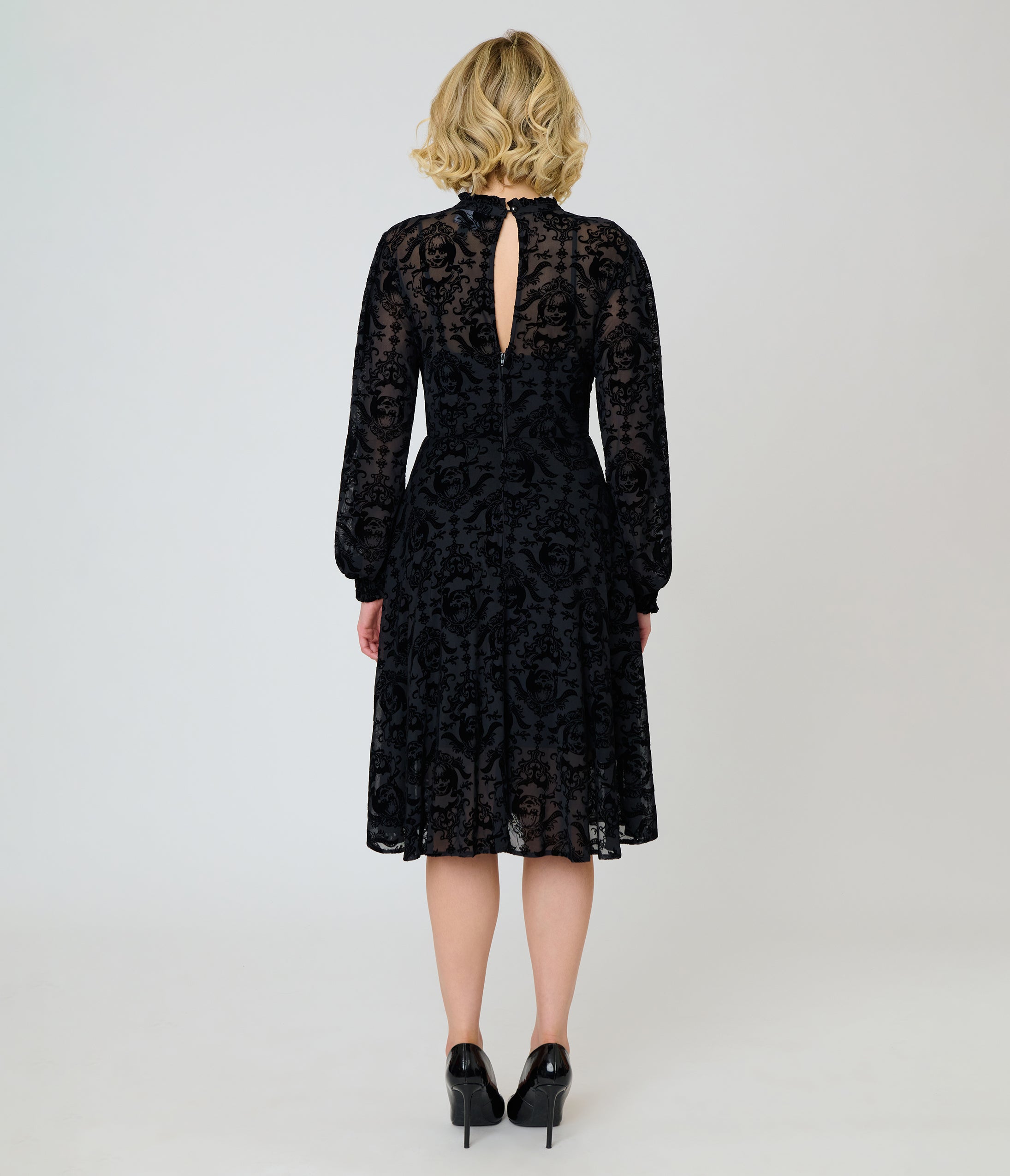 Annabelle x Unique Vintage 1970s Black Flocked Leota Swing Dress