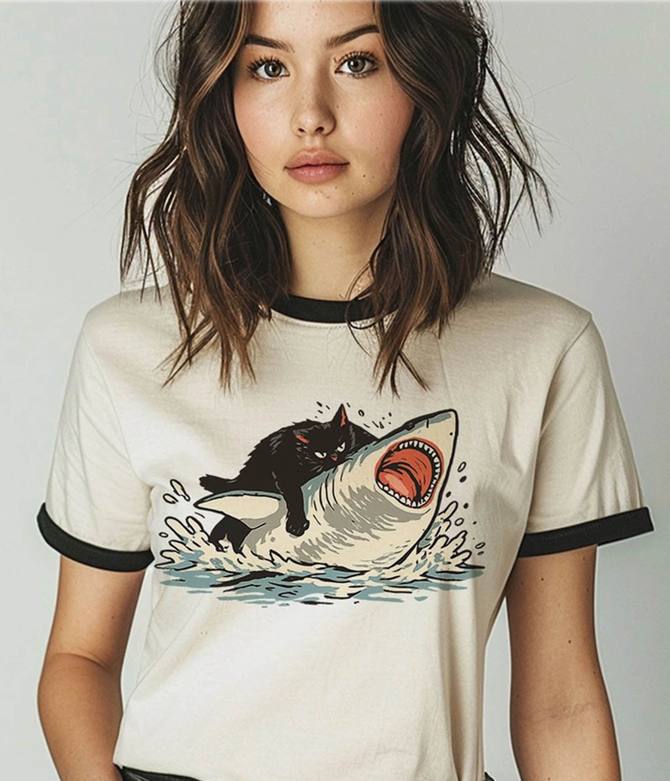 Ivory Cat Riding Shark Ringer Graphic Tee
