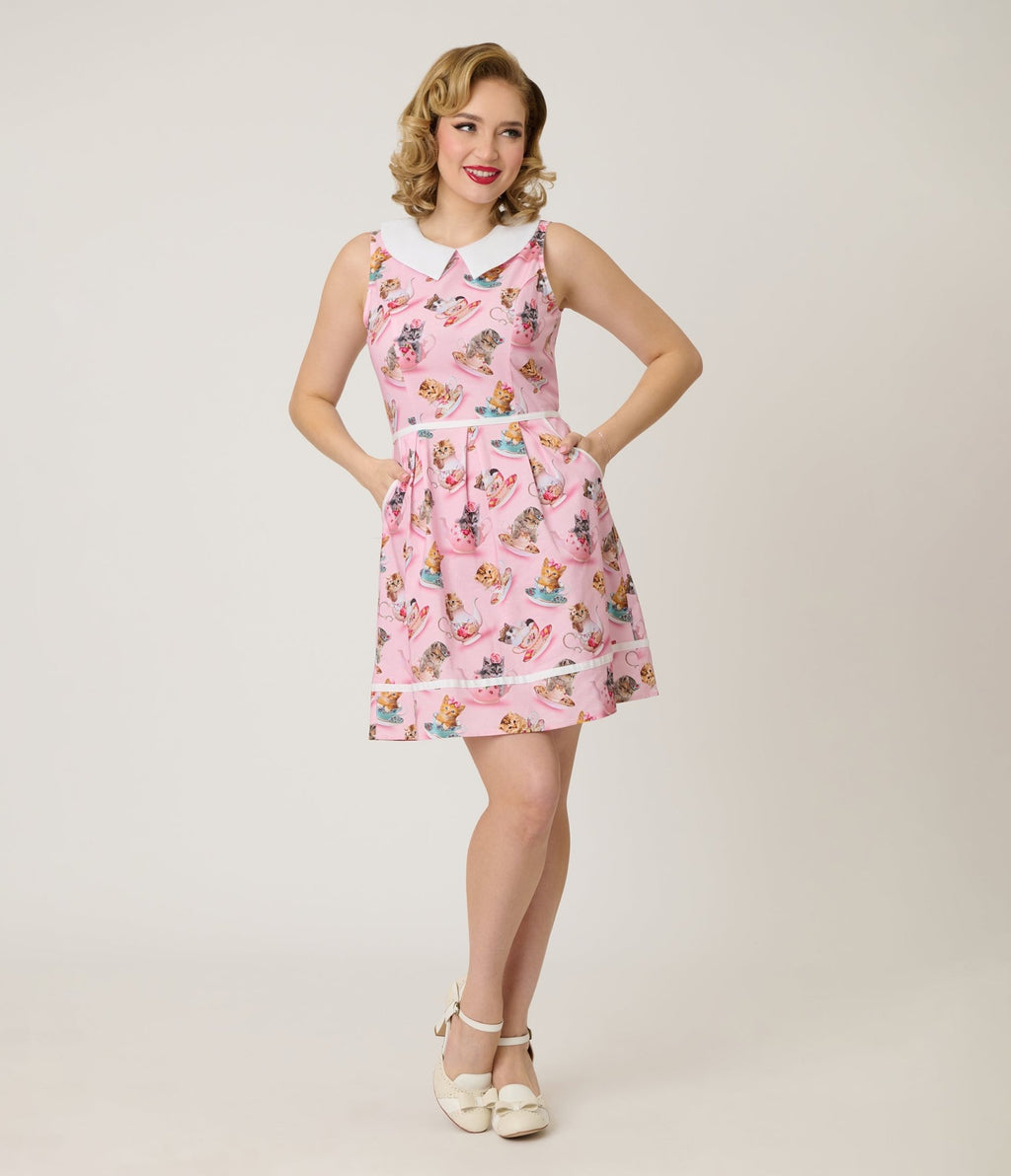 british retro kitty dress The most magical of frocks is back & ready to enchant. Made with opulent faux fur collars & cuffs, Shop www.britishretro.co.uk, #britishretro #britishretroclothing #madeinlondon | British Retro