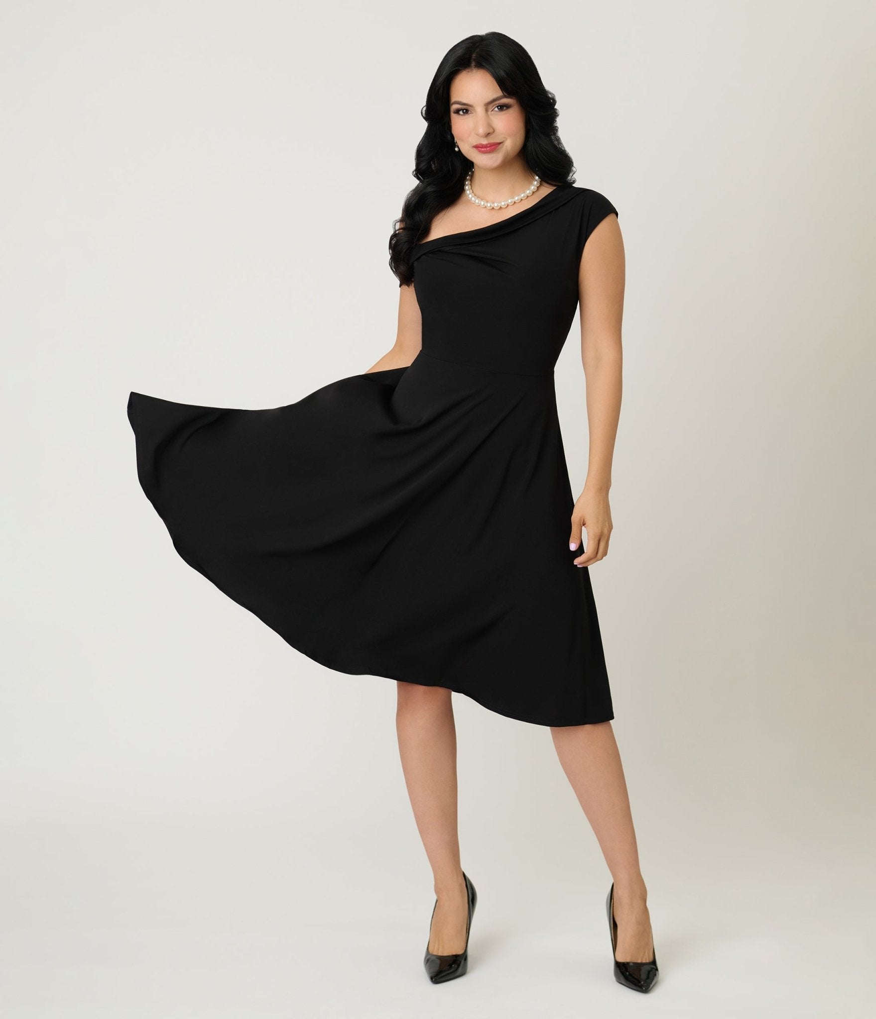 Unique Vintage Black Asymmetrical Neck Swing Dress