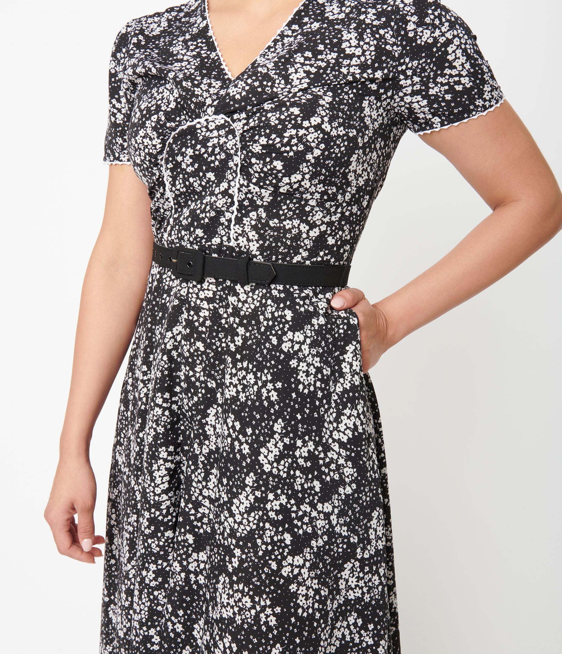 1950s Unique Vintage Black & Ivory Ditzy Floral Petula Swing Dress