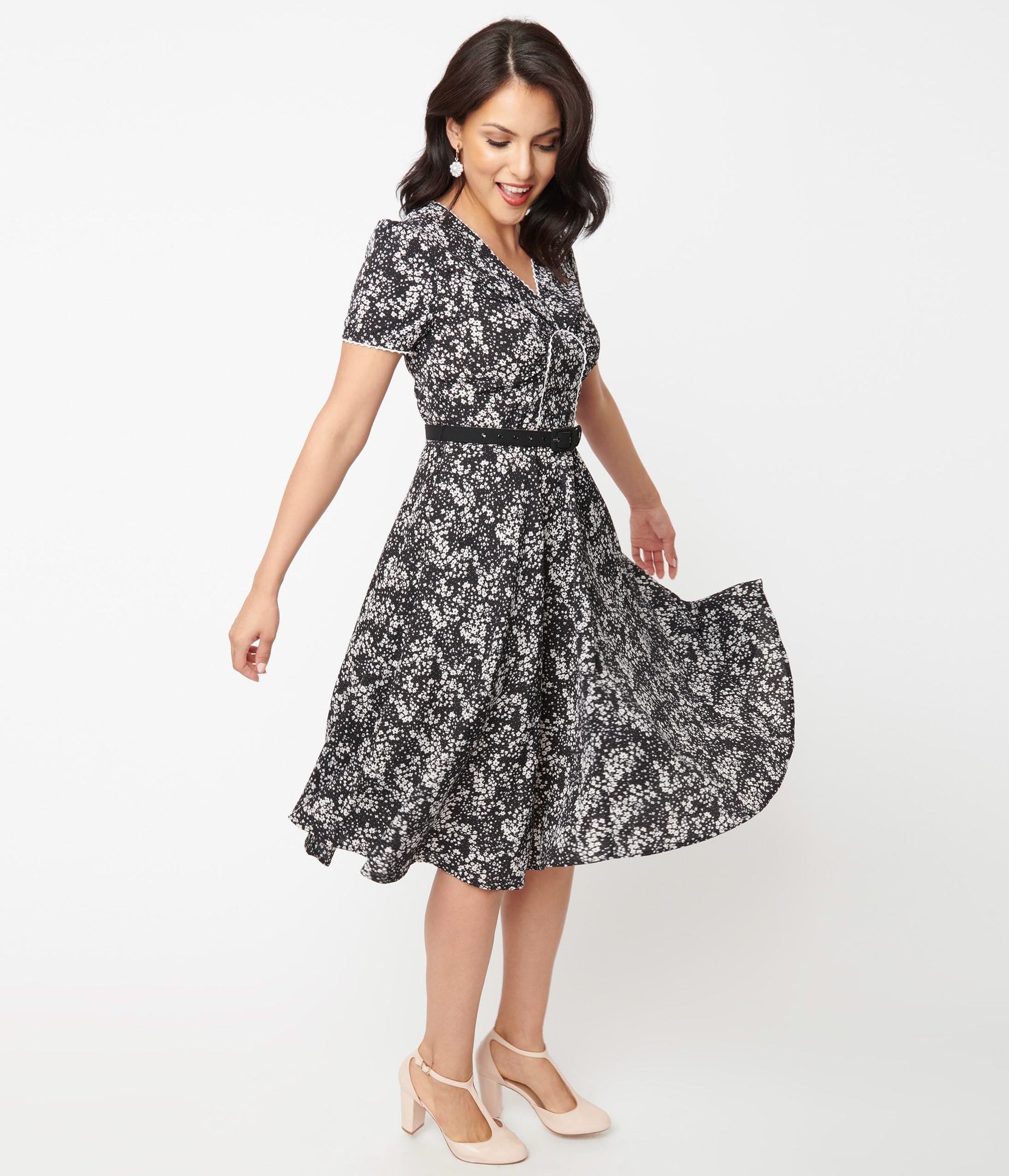 1950s Unique Vintage Black & Ivory Ditzy Floral Petula Swing Dress