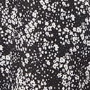 1950s Unique Vintage Black & Ivory Ditzy Floral Petula Swing Dress