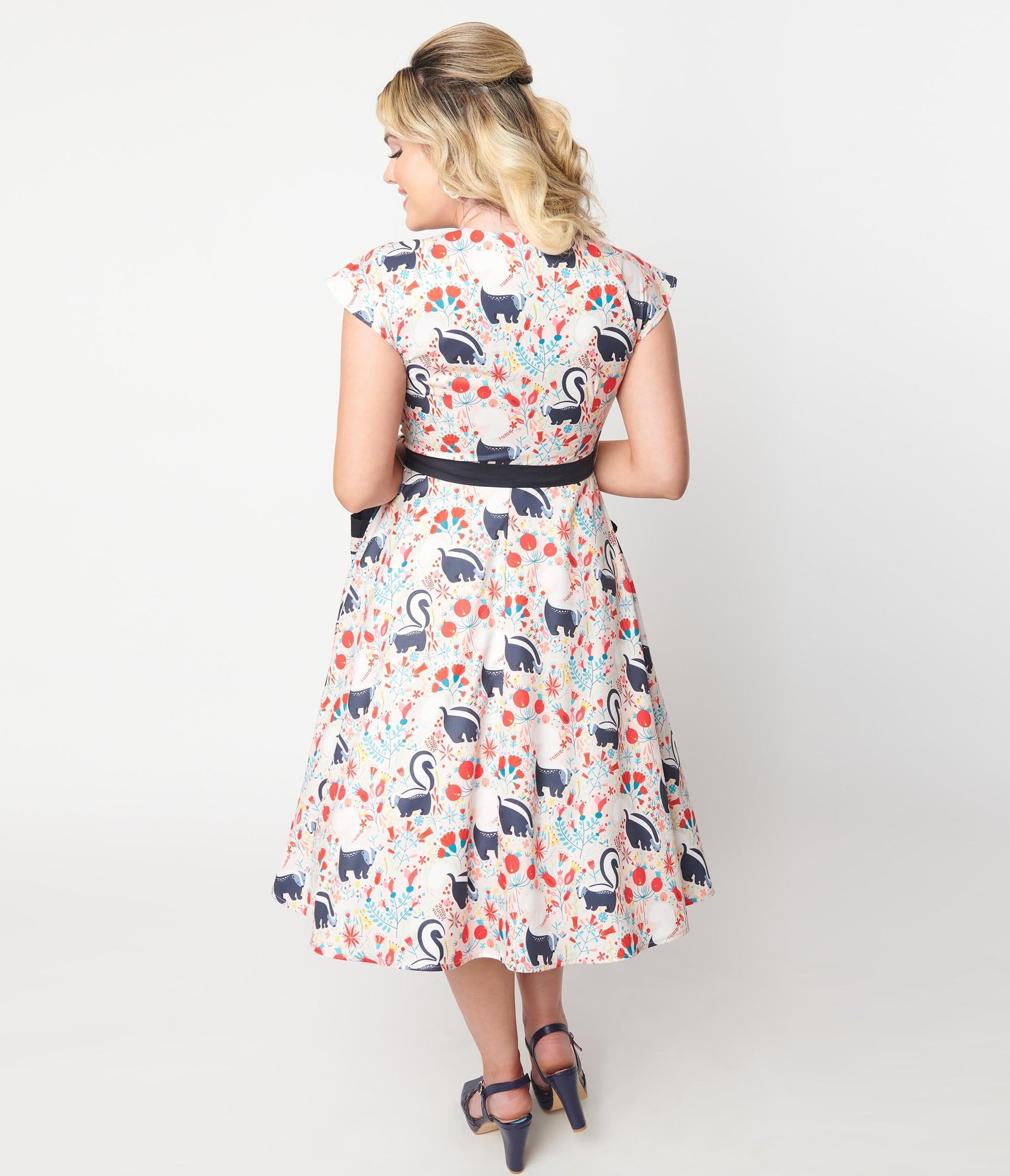 Unique Vintage Peach Skunk Print Hedda Swing Dress