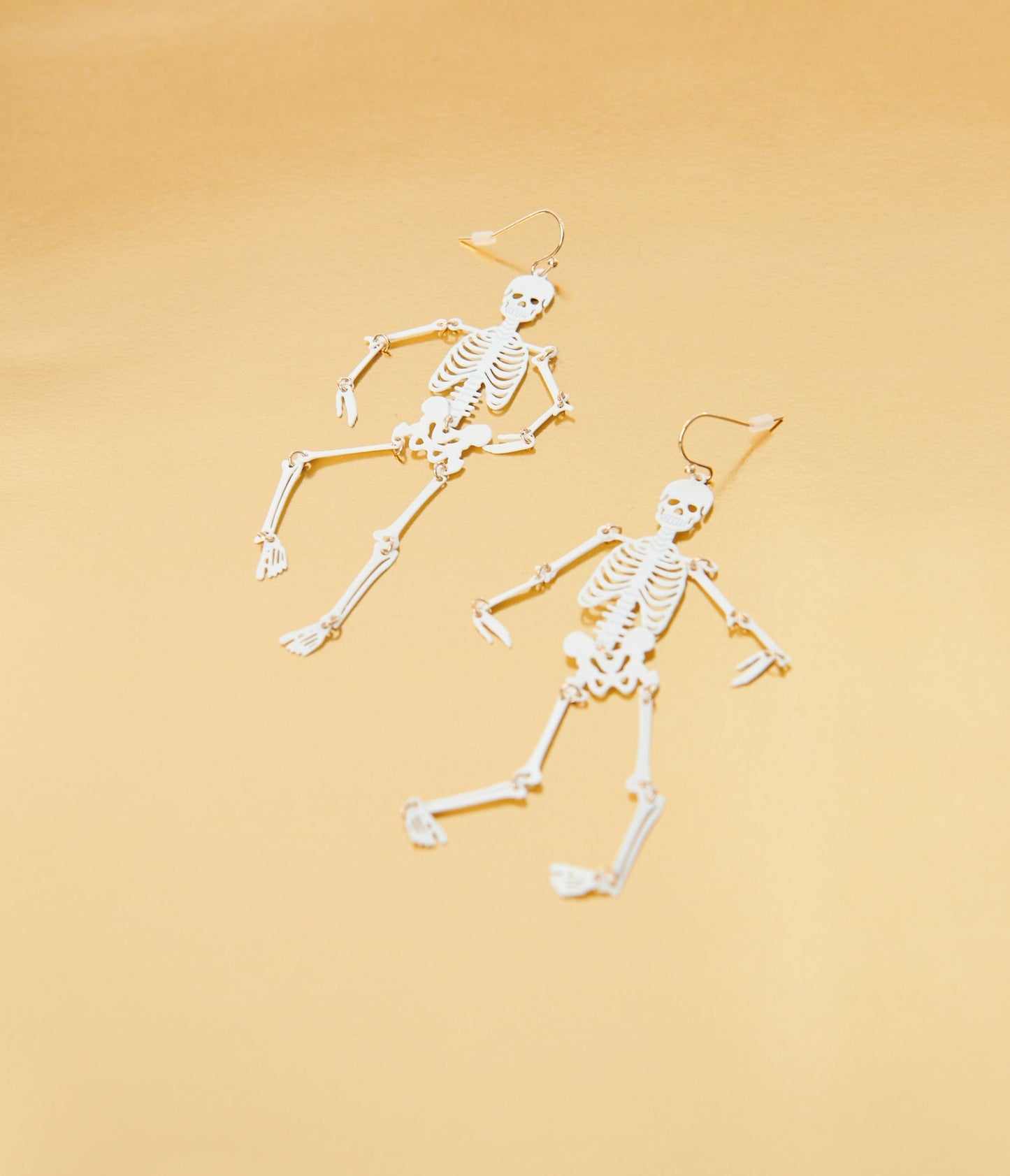 White Dancing Skeleton Earrings