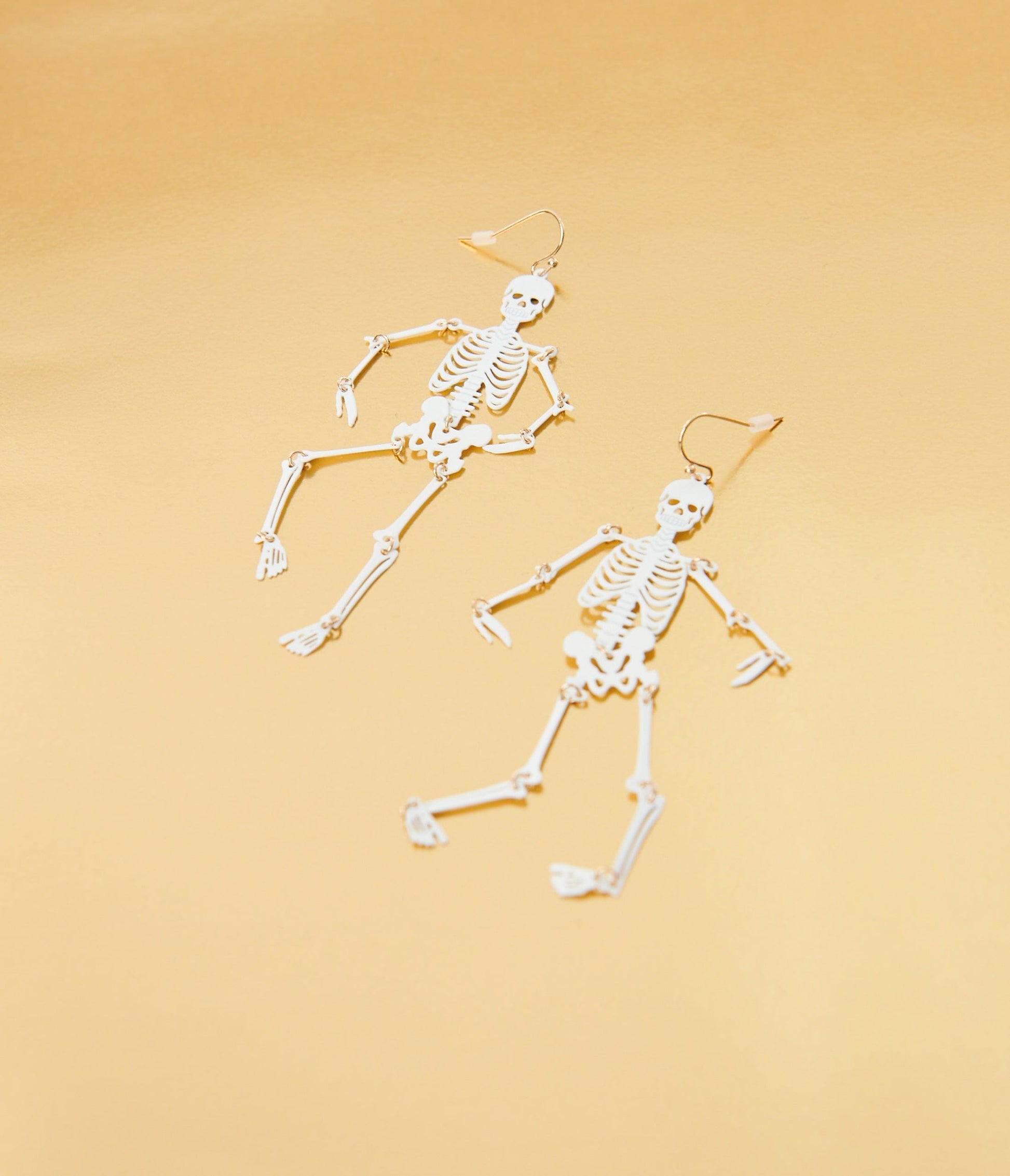 White Dancing Skeleton Earrings