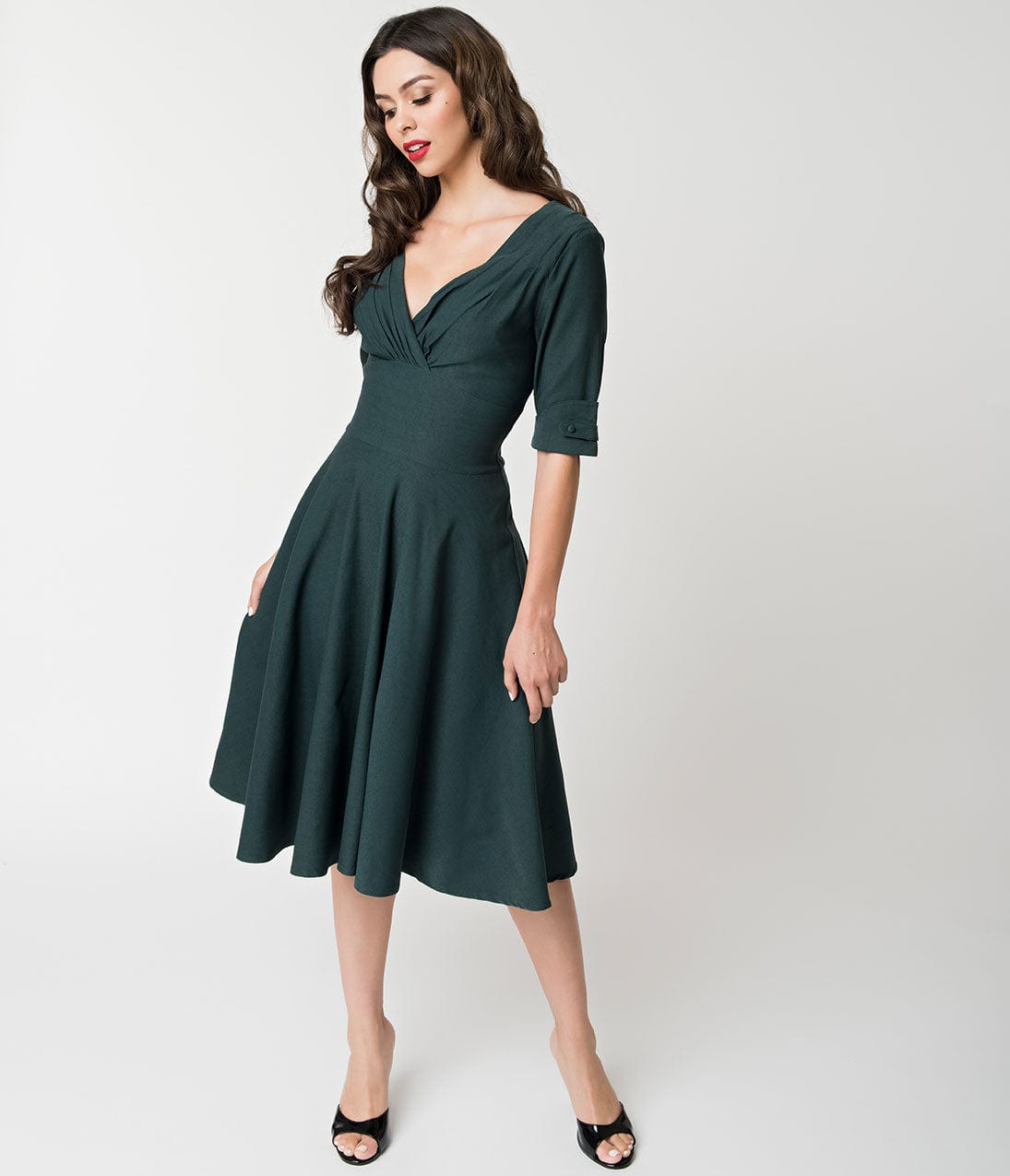Unique Vintage 1950s Dark Green Delores Swing Dress with Sleeves