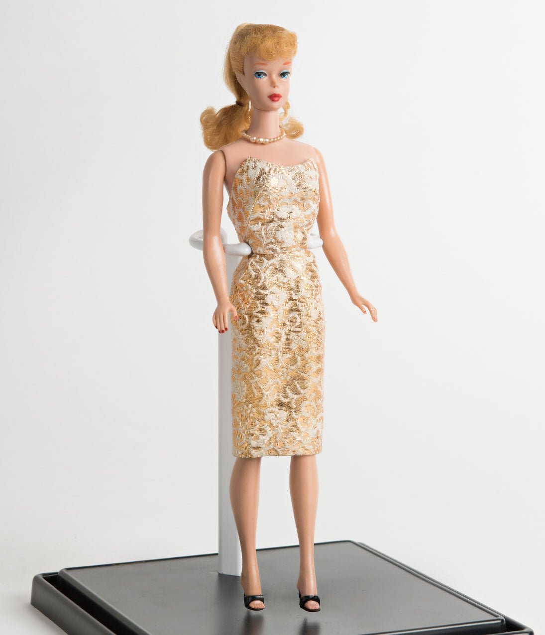 Barbie in store gold dress