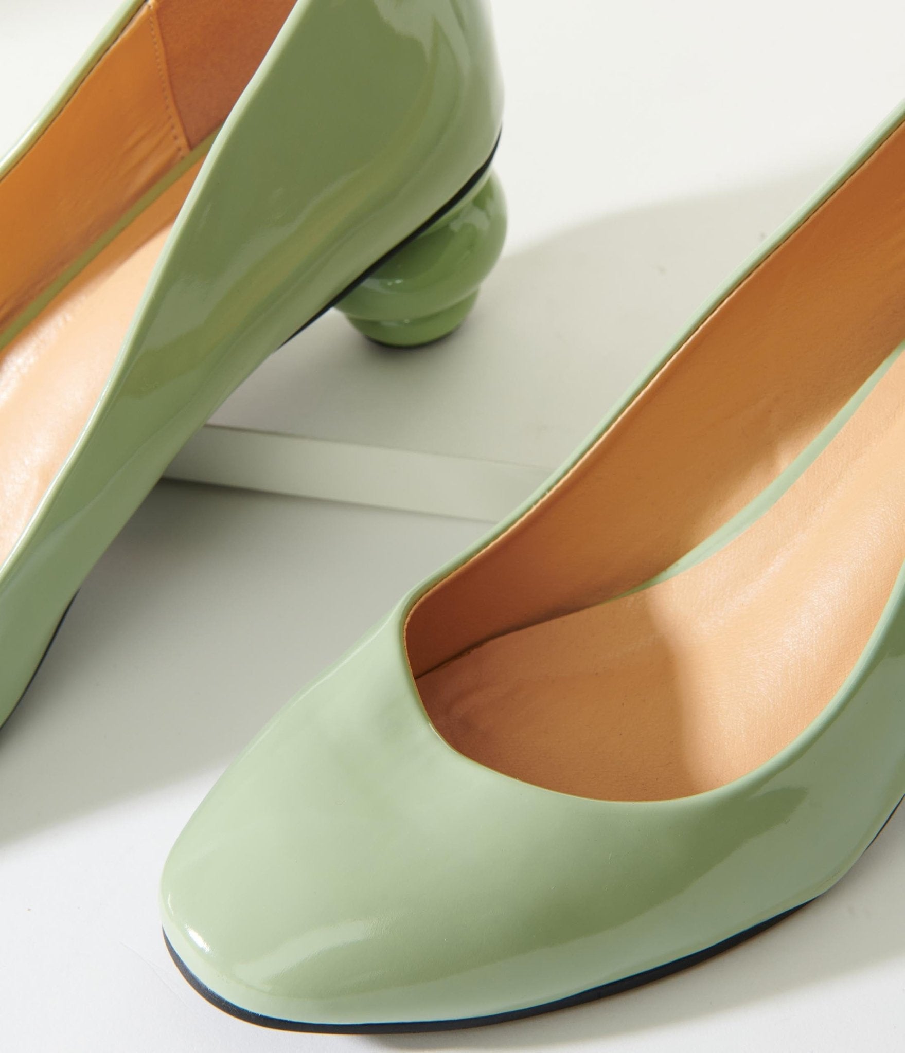 Green shop patent pumps