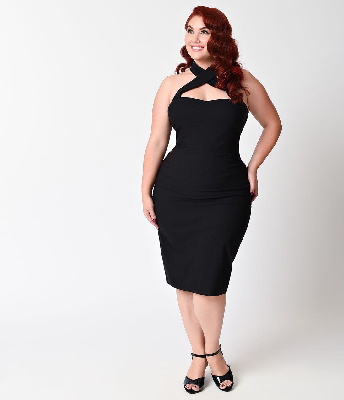 black curvy dresses Unique Vintage Plus Size 1960s Black Criss Cross Halter Penelope Wiggle Dress