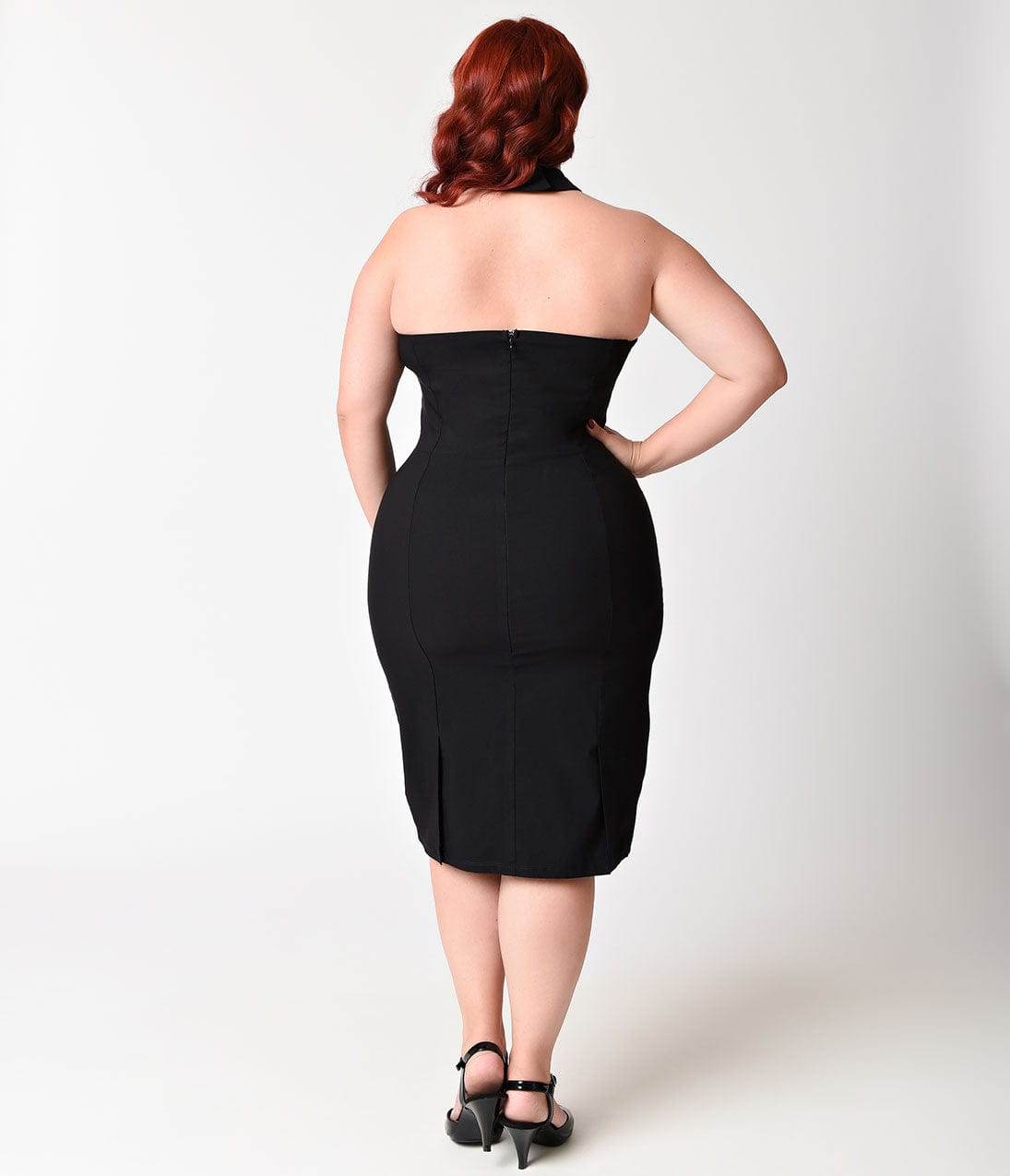 Unique Vintage Plus Size 1960s Black Criss Cross Halter Penelope Wiggle Dress Unique Vintage Plus Size 1960s Black Criss Cross Halter Penelope Wiggle Dress